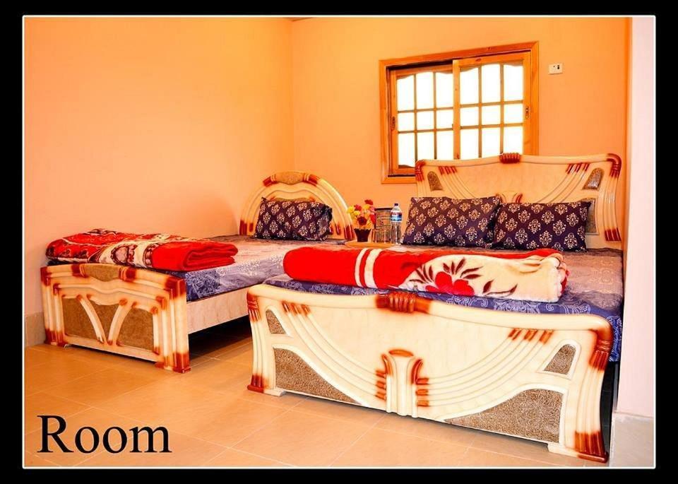 Palm Valley Hotel Sukkur Bagian luar foto